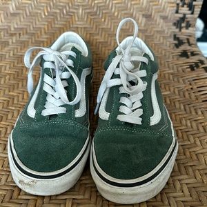 Lightly worn dark green vans.